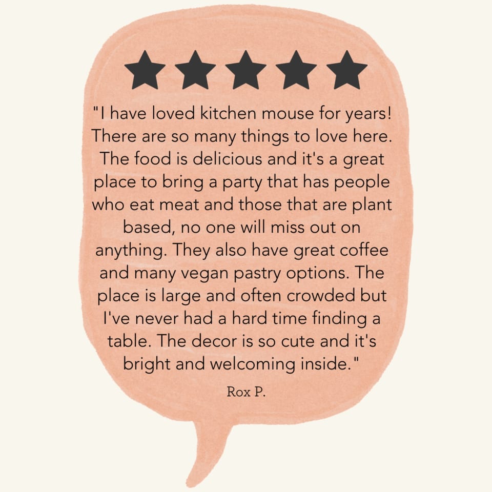 A five-star review for Kitchen Mouse, praising its food, vegan options, and welcoming atmosphere.